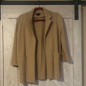 J Crew 35.5% Wool.
Dry clean only.